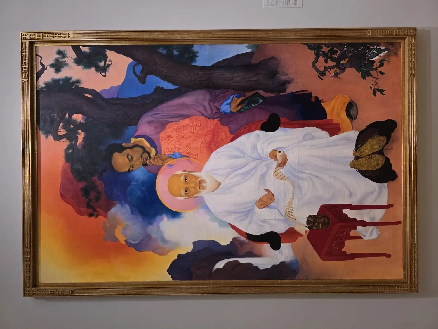 老子和尹喜。书卷中是道德经通行本前两章内容